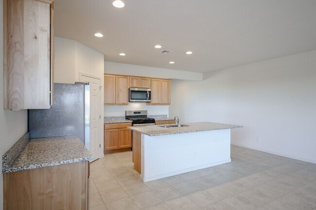 Building Photo - New 4 Bedroom + Den Home in Asante Community