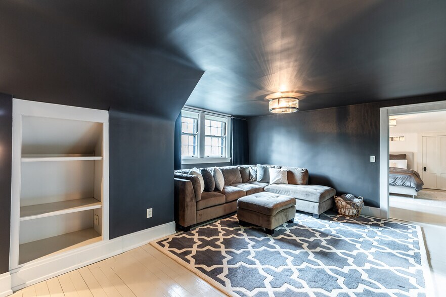 This suite offers living area perfect for TV viewing. - 4061 Beechwood Ave