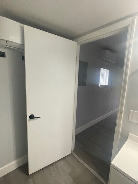 Bathroom into bedroom - 13691 E Hwy 25