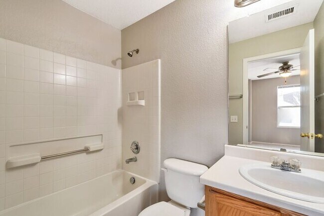 Building Photo - 3BR Townhome Near DIA & Light Rail | New Carpet, Garage & Fenced Patio