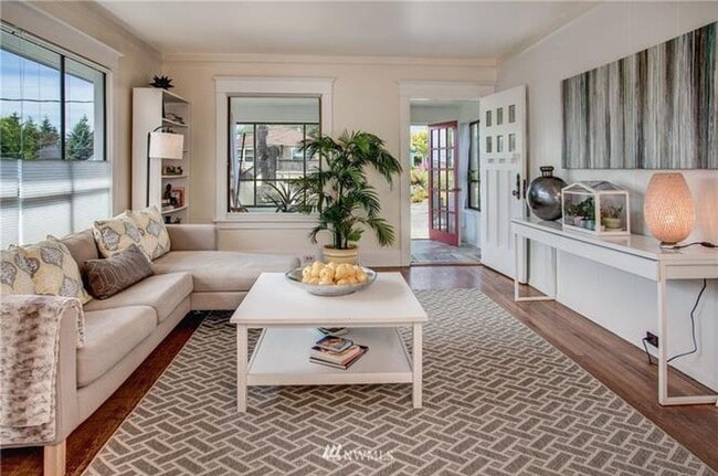 Building Photo - Timeless Charm Meets Thoughtful Updates in This Light-Filled Retreat