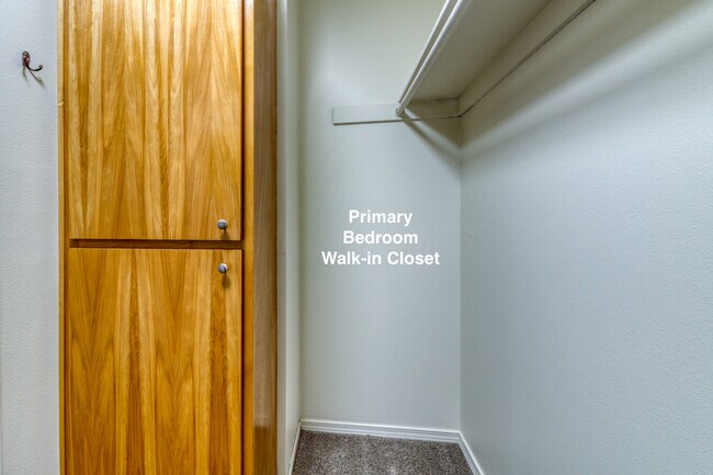 Primary Bedroom Walk-in closet - 1923 NE Derek Dr