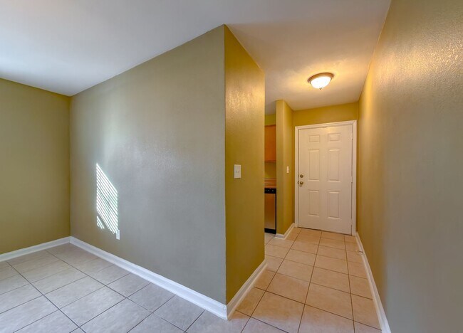 Building Photo - LOVELY & Modern NW 2/1 w/ New Flooring & Huge Privacy Fenced Yard that Inc Lawn Maintenance! Avai...