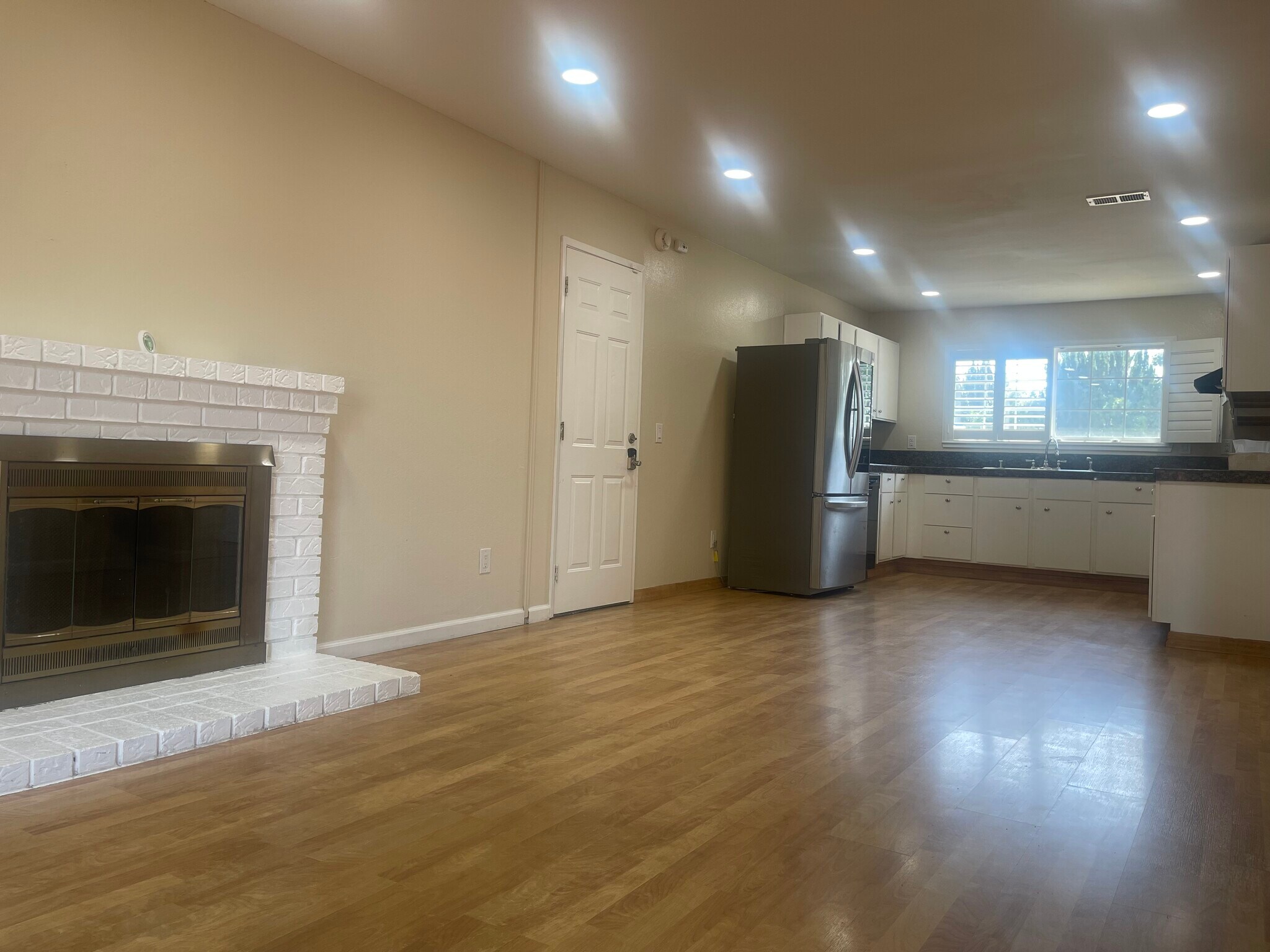 Family Room Fireplace with Kitchen - 1650 Farm Bureau Rd