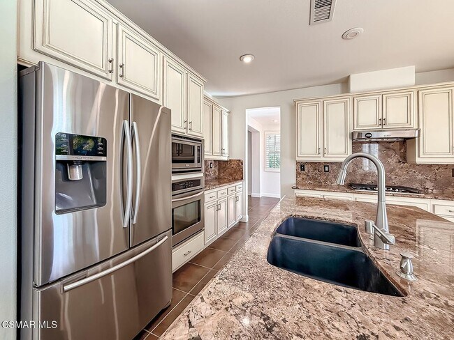 Building Photo - Beautiful Light and Bright Dos Vientos Home featuring 4 Bedrooms + 3 Bathrooms