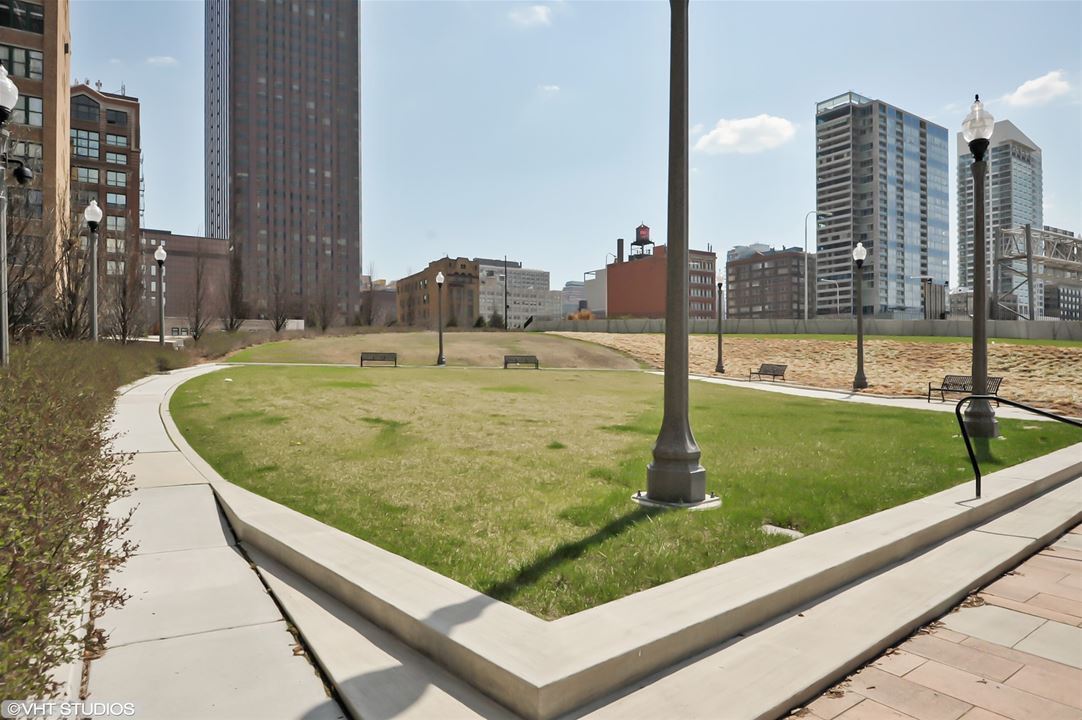 Dog Park adjacent to building - 235 W Van Buren St