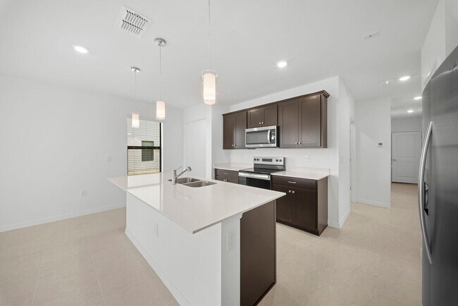 Building Photo - Newly constructed property offers four spacious bedrooms, two full bath in Lehigh Acres