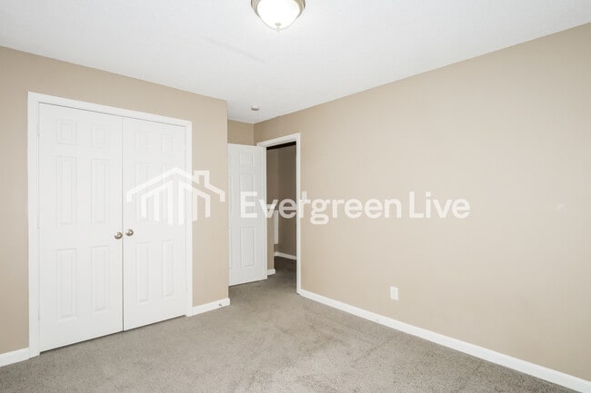 Building Photo - 6000 Wagon Hill Rd E