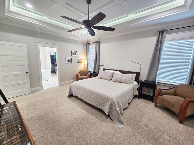 Building Photo - Spacious 4BR/3BA Home with Open Floor Plan, Screened Porch & Fenced Backyard