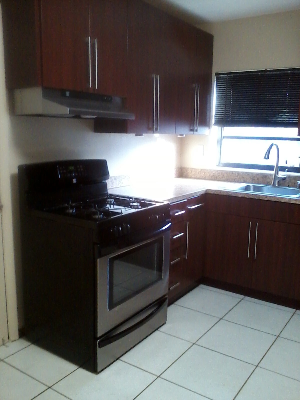 Stainless fridge black gas stove - 18563 SW 93rd Pl