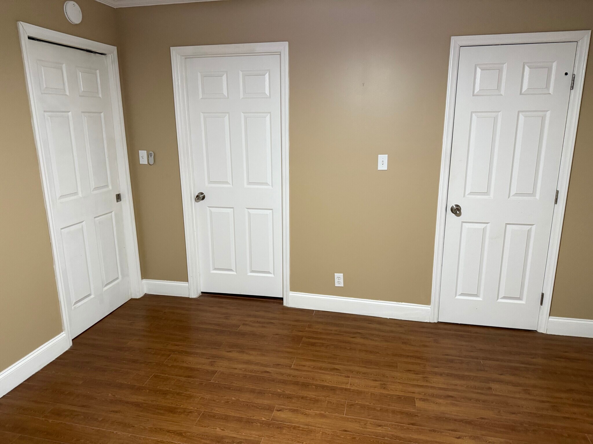 Primary Bedroom #1 with Ensuite Bathroom (middle door and Walk-In Closet right door) - 18 Waters Ave