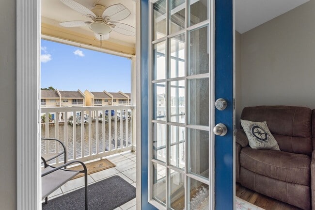 Building Photo - Welcome to Coastal Living at Harbor Landing Condominiums!