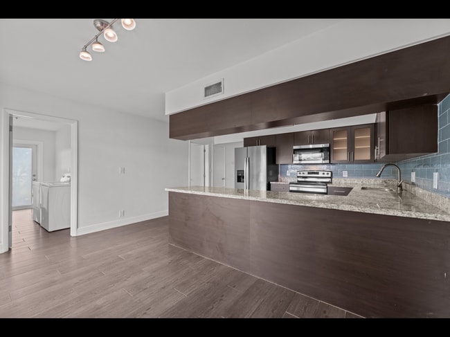 Building Photo - 2133 NE 56th Ct