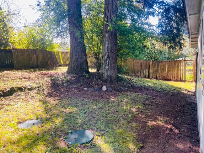 Building Photo - Charming 3BR/1BA w/ 1-car garage, long driveway, fenced yard, wood stove & shed/workshop.