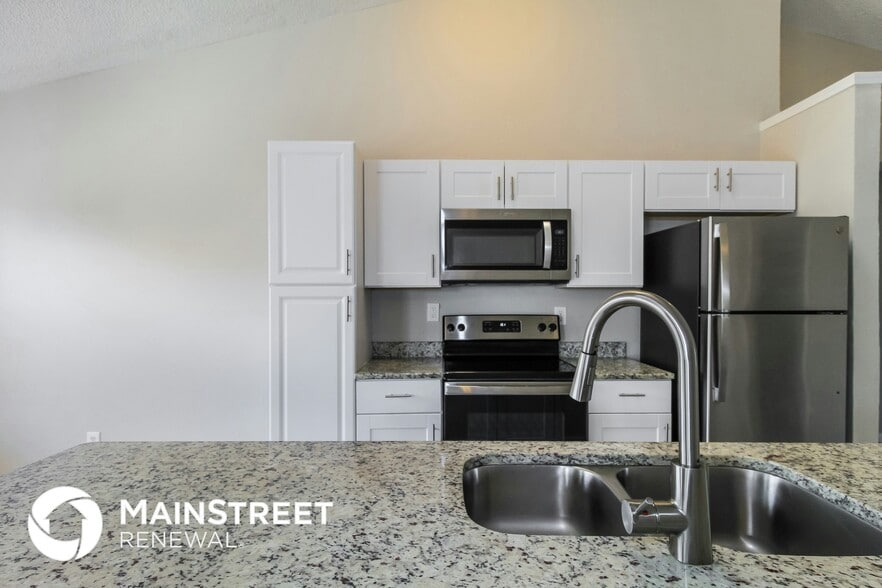 Building Photo - 5520 Creek Valley Dr