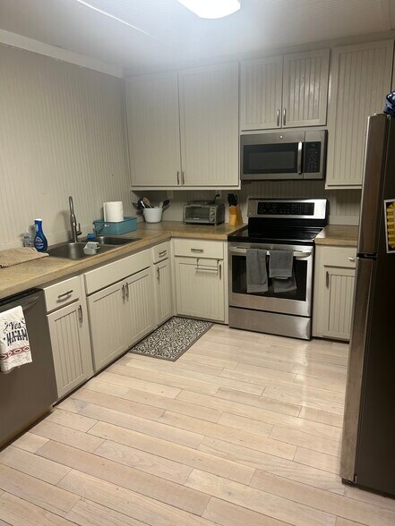 Furniture not included - 213 W 12th St
