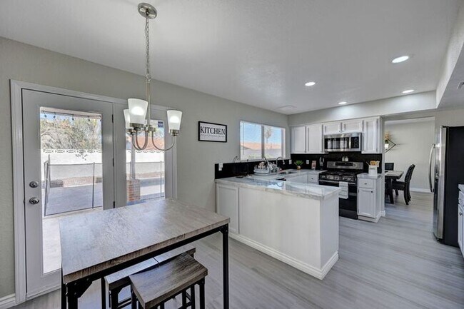 Building Photo - Fully Furnished Entertainer’s Dream with Resort-Style Pool & RV Parking!