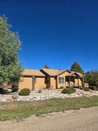 Building Photo - Home on Woodsman