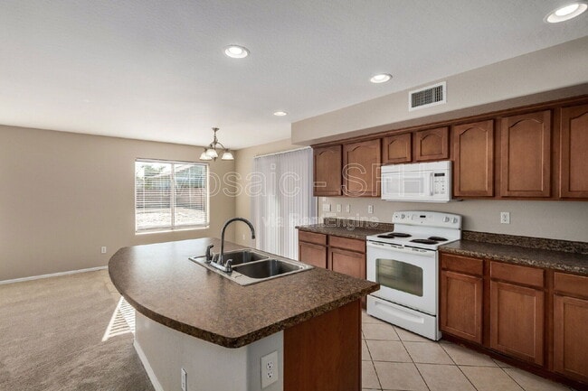 Building Photo - 5215 W Hasan Dr