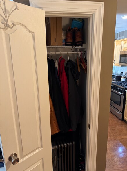 Foyer Closet Open - 100 West Ave