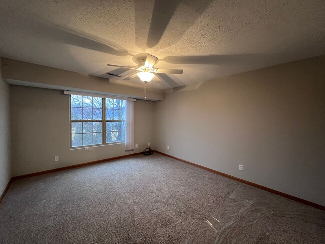 Building Photo - End Unit Two Bed Two Bath Second Floor Con...