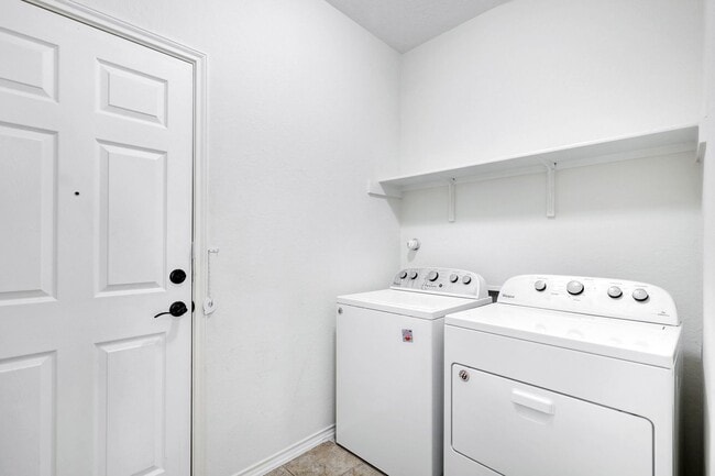 Building Photo - ***APPLICATION CURRENTLY UNDER REVIEW***Luxurious Move-In Ready Home with Versatile Living Spaces