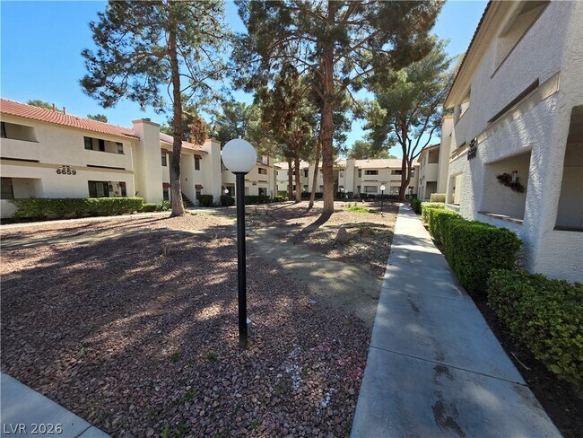 Building Photo - 6671 W Tropicana Ave