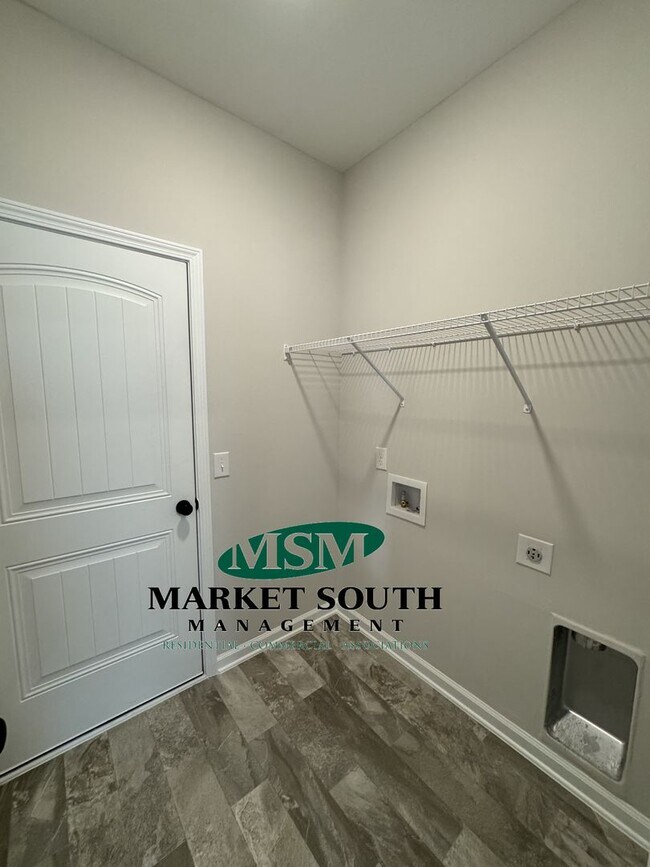 Building Photo - NEW CONSTRUCTION WITH PRIVACY FENCED YARD