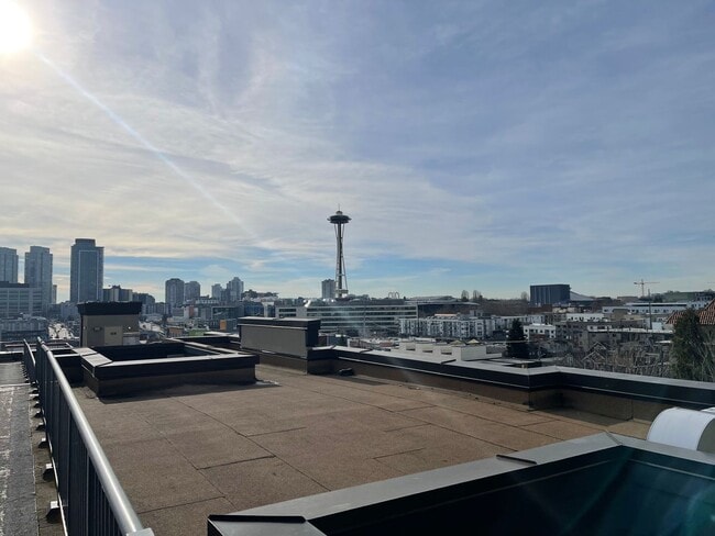 Building Photo - Updated Condo with Parking for One, Great Location and Communal Roof-top Deck!!