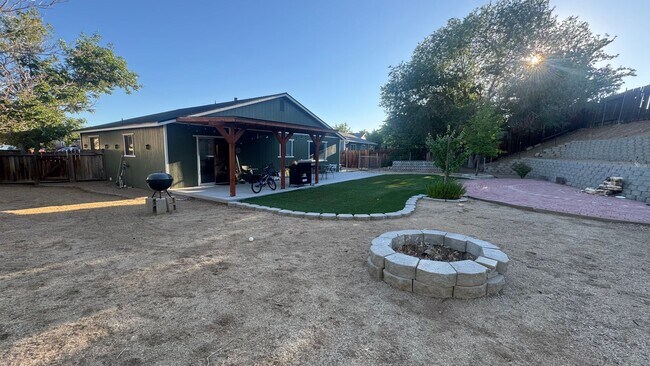 Building Photo - 4bed/2bath/2car garage. RV parking & massive landscaped backyard in cut-de-sac
