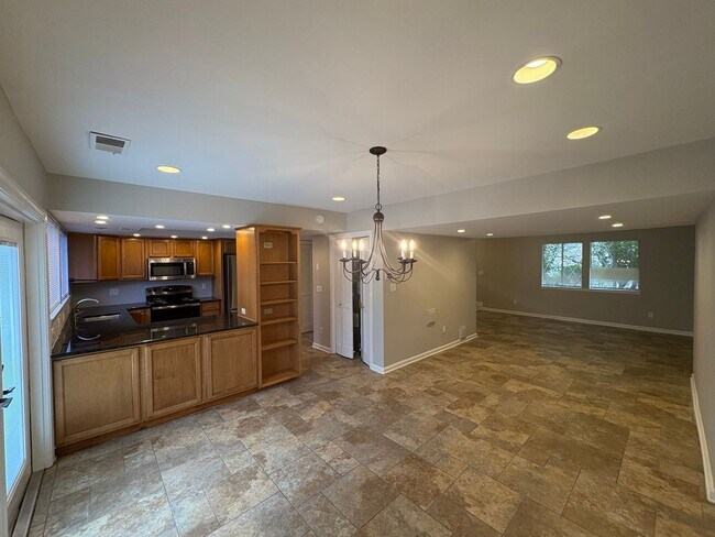 Building Photo - Four Bedroom Townhome Available Now