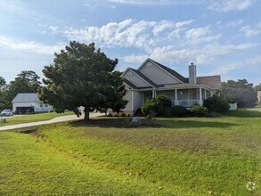 Building Photo - Blue Heron Bay Home Available Now!
