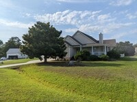 Building Photo - Blue Heron Bay Home Available Now!