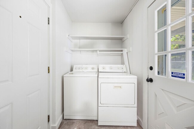 Building Photo - **$40K+ IN UPGRADES AND A FENCED BACKYARD WITH TWO STORAGE BUILDINGS**
