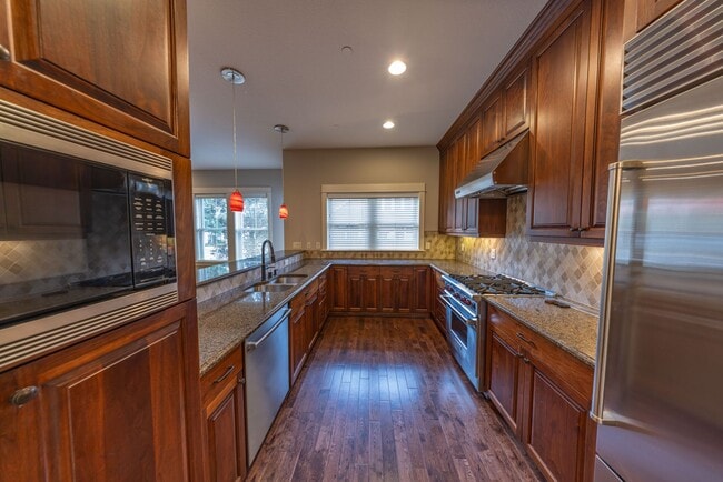 Building Photo - 2 Creeks Condominiums - Gated Community on...
