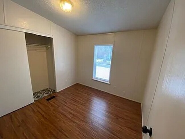 Building Photo - Charming 3 Bedroom Home in Quiet, Tree Lined Neighborhood