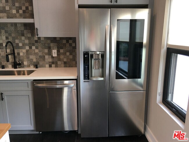 Building Photo - 1180 S Tremaine Ave