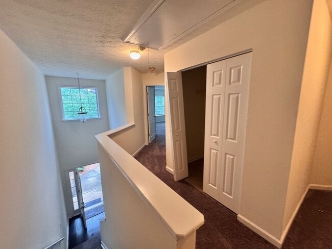 Building Photo - Peaceful 2-Story Townhome - Soothing sound...