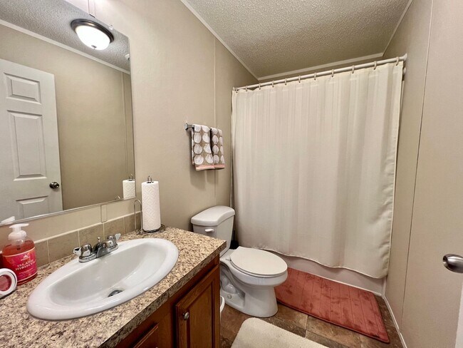 Building Photo - Fully Furnished and Utilities Included!