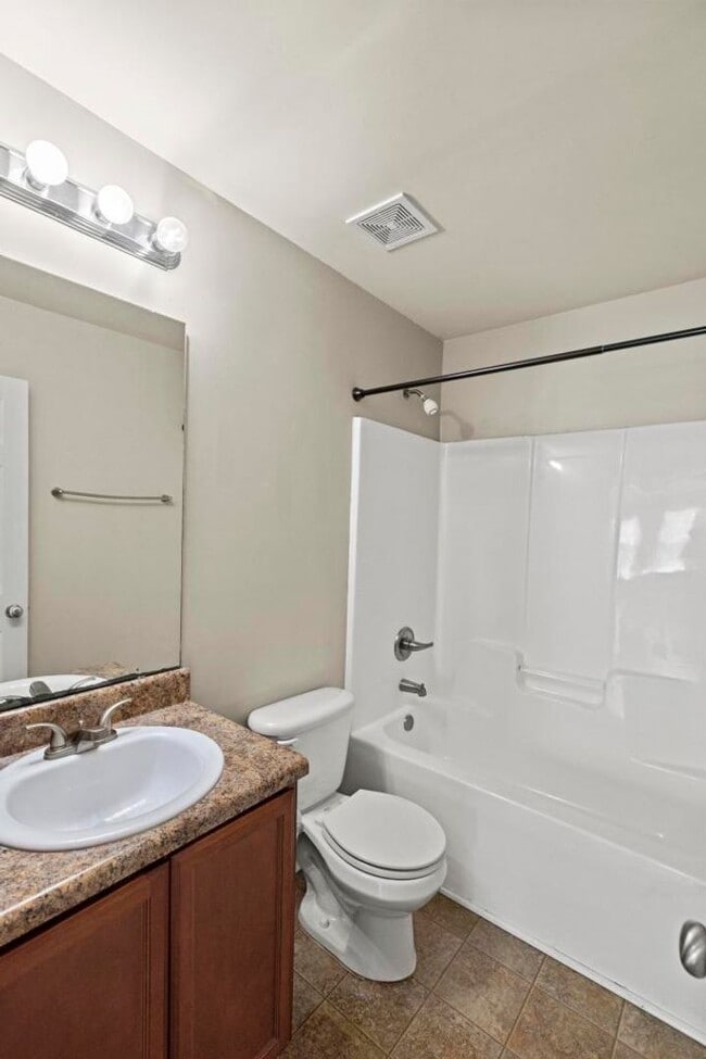 Building Photo - End Unit with Lots of Upgrades!