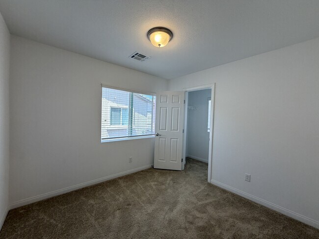 Building Photo - 7869 Tyrell Peaks St