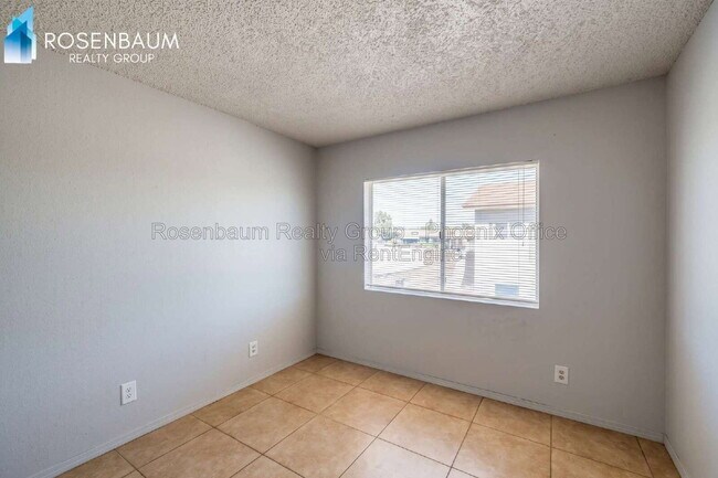 Building Photo - 6440 E Alder Ave