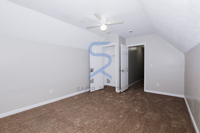 Building Photo - Move in before January 31st and choose your reward: a $250 Amazon Gift Card or a 55" Smart TV!