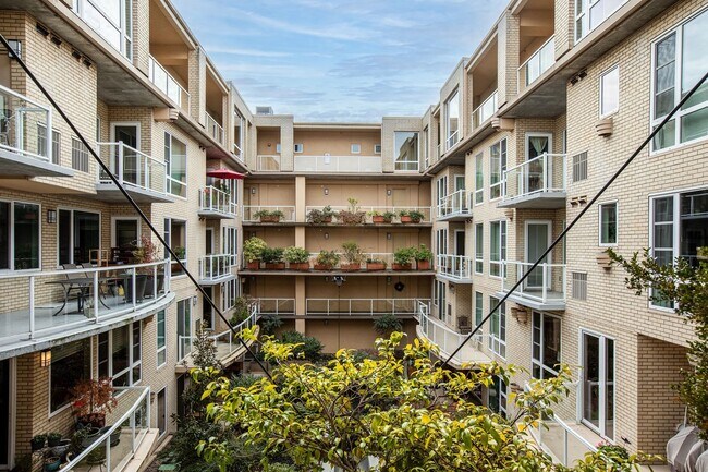 Building Photo - Sweet + secure 1/1 condo with parking, extra storage room + AC available now!