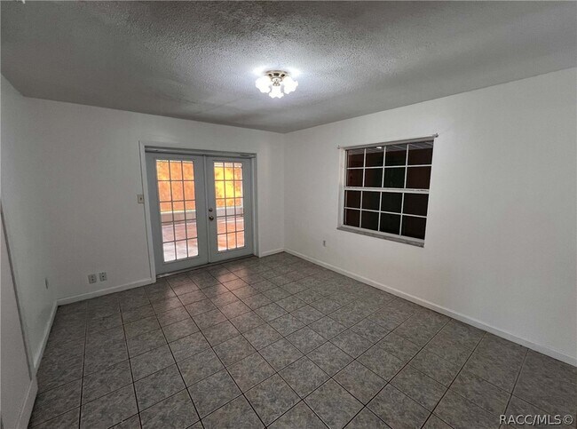 Building Photo - 7660 W Tropical Ln