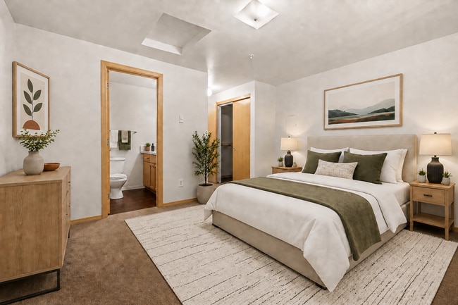 Staged Bedroom + Ensuite l 2x2 Standard l Villas at Lawrence Apartments - Villas at Lawrence