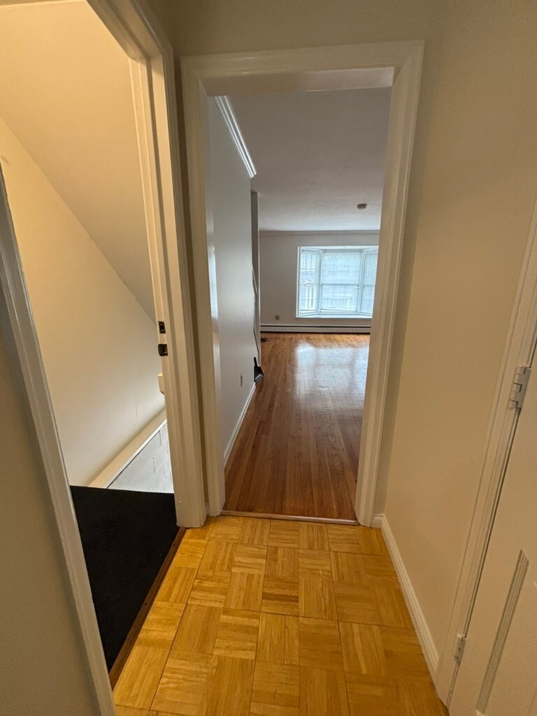 Stairs down to garage, laundry, storage - 43 State St