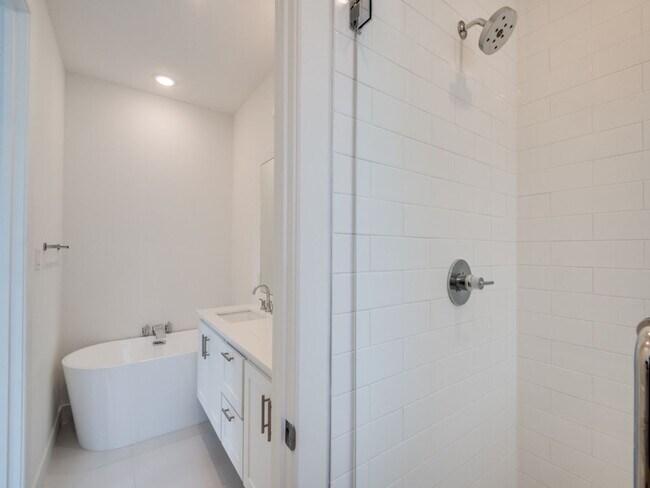 Building Photo - Welcome to a beautiful Craftsman-style end...