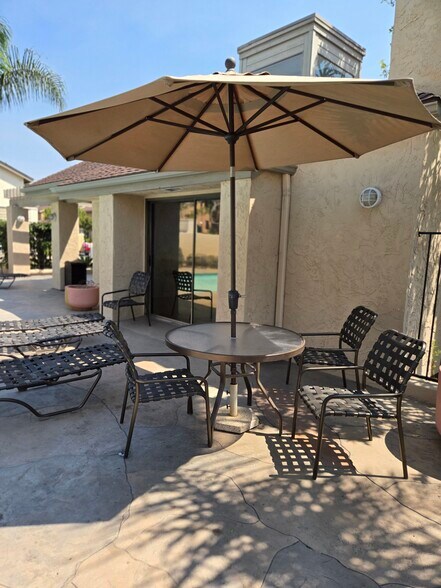 back of the clubhouse that has access to the pool for pool parties - 8830 Via Andar