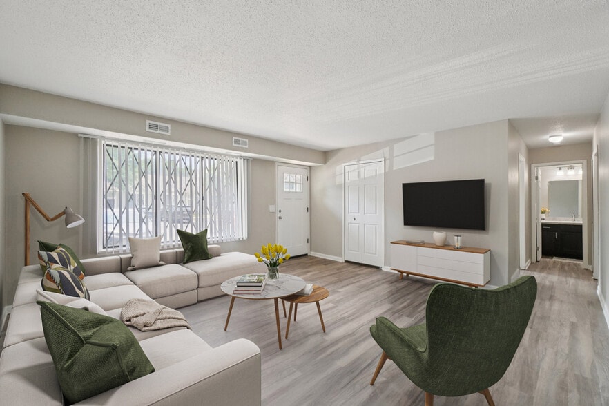 Living Space with Vinyl Plank - Beachwood Apartments and Townhomes